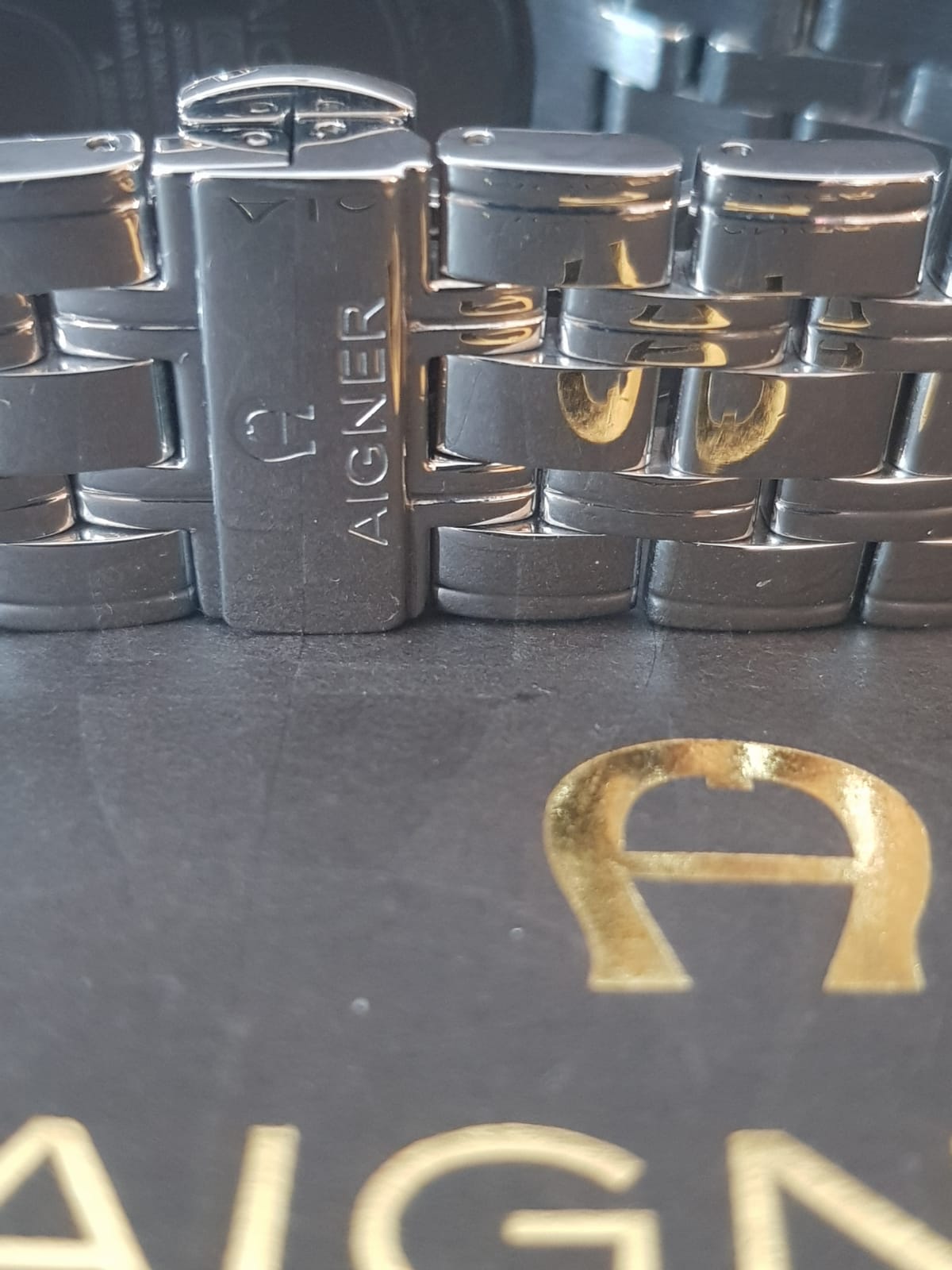 Aigner Swiss Made Luxury Watch - Crystal Studded Bezel & Horseshoe Logo